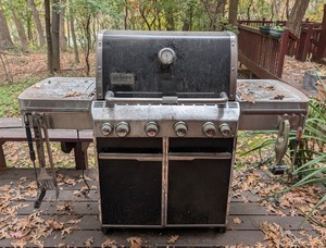lot 174 image: BY - Weber Stainless Steel Gas Grill with Side Tables and Storage