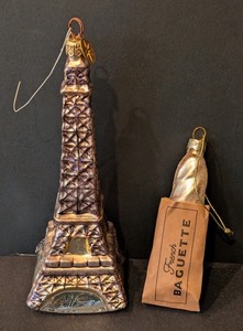 lot 269 image: DR - Radko Eiffel Tower Glass Ornament and French Baguette Ornament Set