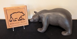 lot 313 image: K - Ceramic Bear Sculpture and Glacier Park Masterworks Tile Trivet Set