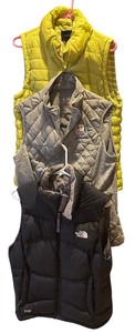 lot 99R image: K - Three Size Medium Vests by The North Face, Tribal and Adidas