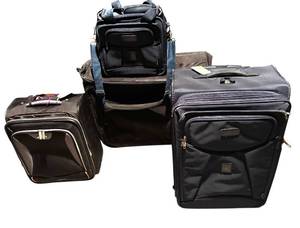 lot 242H image: LWO - Set of 2 Wheeled Black Luggage Suitcases by Travelpro and Skyway