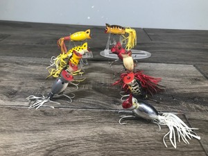 lot 214 image: Lot of 10 Collectible Fred Arbogast Hula Popper Fishing Lures