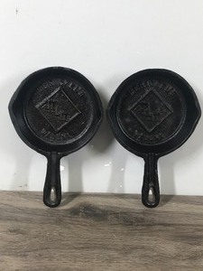 lot 239 image: 2 - Small Collectible Cast Iron Skillets - Merickels Wadena - Possibly Ashtrays
