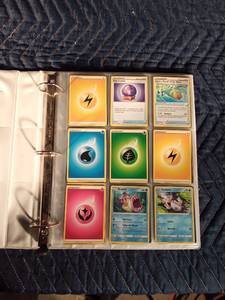 lot 34 image: Binder of 90 Pokmon trading cards