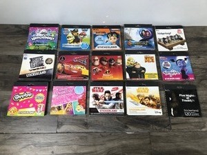 lot 251 image: Lot of 68 Sticker Books - Star Wars - Cars - Paw Patrol - Vamprina - Shopkins and More