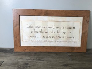 lot 254 image: Framed Picture Sign Life is not measured by the number of breaths we take, but by the moments that take our breath away