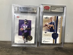 lot 283 image: 2 - Football Cards in Hard Cases  2001 Fleer Authority #149 Chris Barnes Graded Card Beckett 8.5 NM-MT & 2002 Score QBC #9 Jim Everett (Not Graded but Sealed Straight from the Factory basically Uncirculated)