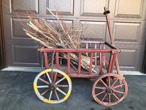 lot 1 image: Vintage Wooden Cart with Wood WheelsSpokes and Metal Casing over the Tires  - smoke free 