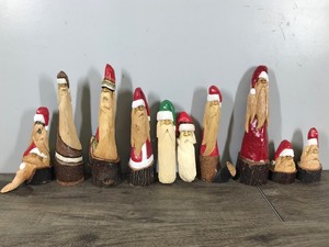 lot 301 image: Lot of 10 Santa Gnome Elf Wood Hand Carved Figurines by W. Dawydenko Minnesota Folk Art - Signature of Artist is on the Bottom of Figurines