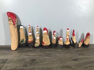 lot 303 image: Lot of 10 Santa Gnome Elf Wood Hand Carved Figurines by W. Dawydenko Minnesota Folk Art - Signature of Artist is on the Bottom of Figurines