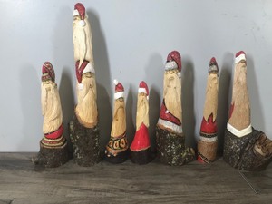 lot 304 image: Lot of 7 Santa Gnome Elf Wood Hand Carved Figurines by W. Dawydenko Minnesota Folk Art - Signature of Artist is on the Bottom of Figurines except for one of them does not have a signature