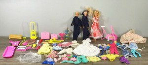 lot 383 image: 4 Barbie Dolls, Clothing, Accessories and More