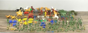 lot 385 image: Vintage Plastic Toy Soldiers, Tanks, Weapons, Cowboys, Indians, Animals and More