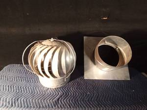 lot 115 image: Large wind-driven turbine roof vent with accessory