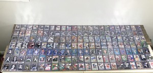lot 409 image: Large Lot of Baseball, Football, Basketball and Hockey Collectible Cards - All the Cards are in Top Loaders