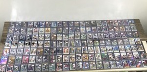lot 419 image: Large Lot of Baseball, Football and  Basketball. All of them are in top loader sleeves