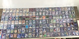 lot 422 image: Lot of Baseball, Football, Basketball and More. All the cards are in top loader sleeves
