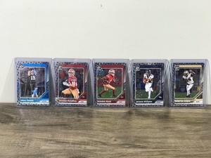 lot 431 image: Lot of 5 - 2024 Optic Blue Stars Football Cards - Adam Thielen - Christian McCaffrey - Brandon Aiyuk - Javonte Williams - Cameron Jordan