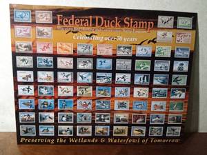 lot 158 image: 70 years of Federal duck stamps tin sign