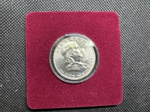 lot 89 image: 1959-D Brilliant Uncirculated Silver Franklin Half Dollar