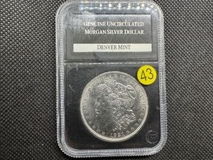 lot 43 image: 1921-D Genuine Uncirculated Morgan Silver Dollar in PCS Holder