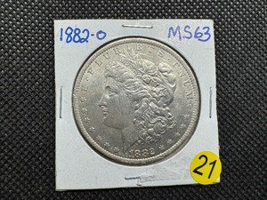 lot 21 image: 1882-O Morgan Silver Dollar Marked MS63 When Purchased