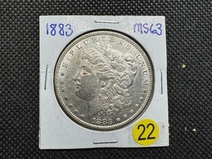 lot 22 image: 1883 Morgan Silver Dollar Marked MS63 When Purchased