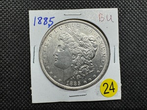 lot 24 image: 1885 Morgan Silver Dollar Marked BU When Purchased