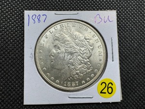 lot 26 image: 1887 Morgan Silver Dollar Marked BU When Purchased