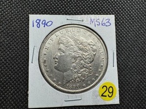 lot 29 image: 1890 Morgan Silver Dollar Marked MS63 When Purchased