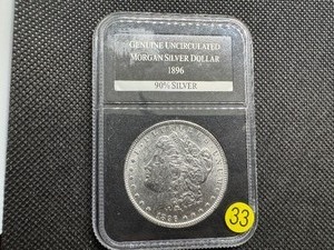lot 33 image: 1896 Genuine Uncirculated Morgan Silver Dollar in PCS Holder
