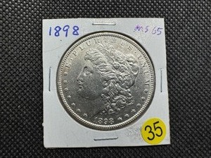 lot 35 image: 1898 Morgan Silver Dollar Marked MS65 When Purchased