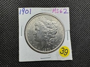 lot 39 image: 1901 Morgan Silver Dollar Marked MS62 When Purchased - Greysheet Wholesale Price For an MS62 is $6000