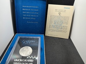 lot 7 image: GSA Uncirculated 1883 Carson City Morgan Dollar with Original Box and Certificate