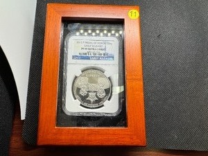 lot 11 image: 2011-P Medal of Honor Silver Dollar NGC PF 69 Ultra Cameo in special wooden Case.