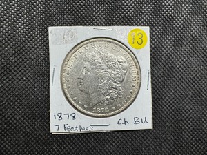lot 13 image: 1878 7 Tailfeathers Morgan Silver Dollar Marked CH BU When Purchased