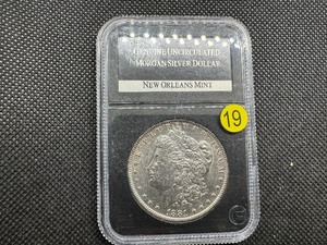 lot 19 image: 1881-O Genuine Uncirculated Morgan Silver Dollar in PCS Holder