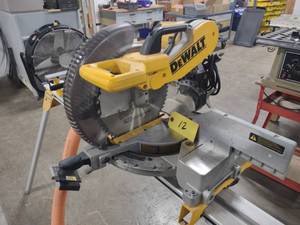 lot 12 image: Dewalt DW716 12 Double Bevel Miter...