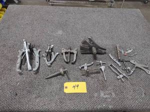 lot 49 image: Assorted Pullers & Parts...