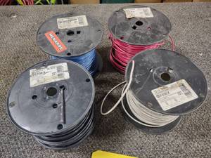 lot 164 image: (4) Rolls 12 ga. Solid Copper Wire...
