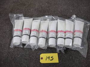 lot 195 image: (8) Tubes Tribolube-12 Synthetic Gr...