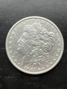 lot 7 image: 1884 Morgan Silver Dollar