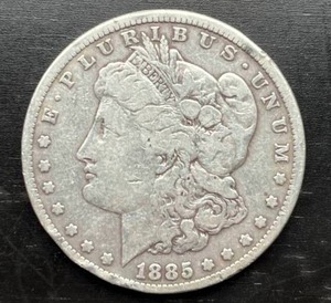 lot 9 image: 1885 Morgan Silver Dollar