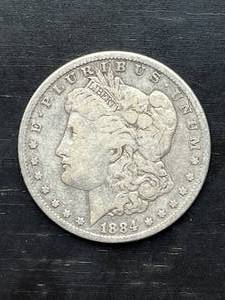 lot 11 image: 1884 Morgan Silver Dollar