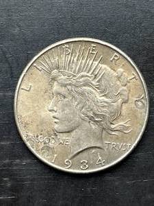 lot 12 image: 1934 Peace Dollar