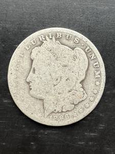 lot 19 image: 1886-O Morgan Silver Dollar