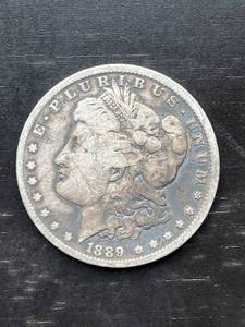 lot 45 image: 1889-O Morgan Silver Dollar