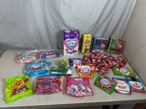 lot 26 image: Assorted Candy, Blow Pops, Candy Canes, Ring Pops, Tootsie Rolls, Chupa Chups, and More