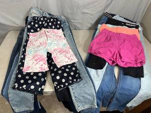 lot 45 image: 21 Pairs of New and Used Youth Girls Bottoms, Jeans, Shorts, Etc. Levis, Gap, H&M, Etc Sizes 8-14