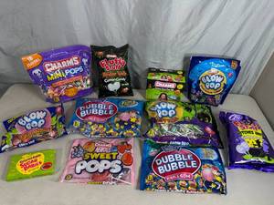 lot 66 image: Assorted Candy, Bubble Gum, Blow Pops, Charms Suckers, Cotton Candy, and More
